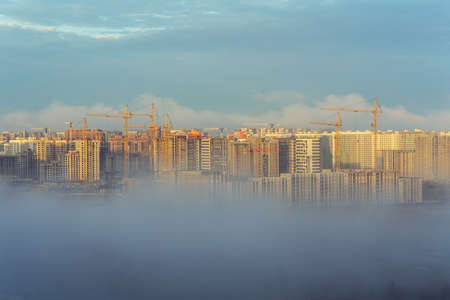 landscape with fog in city on construction site