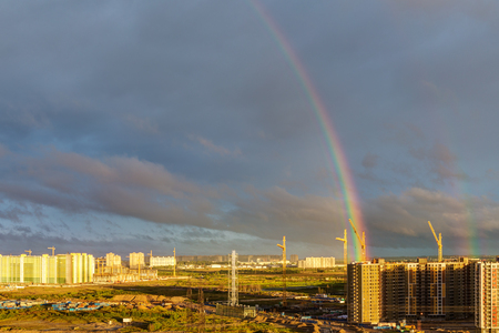 morning landscape with a rainbow above the construction siteのeditorial素材
