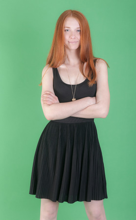 portrait of slim girl in black dressの写真素材