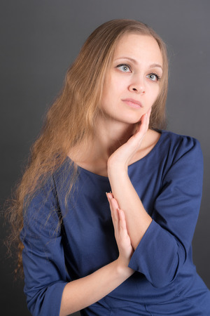 studio portrait of a sensual girl with long hairの写真素材