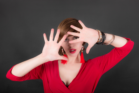 studio portrait of a sensual girl on a black backgroundの写真素材
