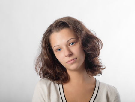 studio portrait of a girl with blue eyesの写真素材