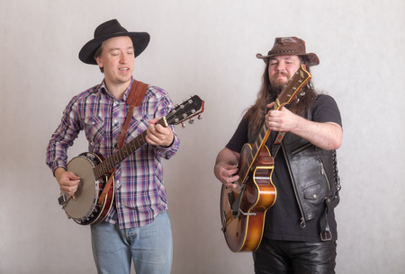 duet of musicians with banjo and guitar