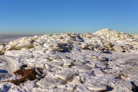 melting ice floes near the sea in spring