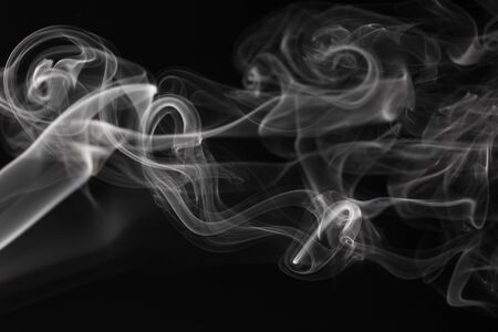 Abstract smoke forms on a blackの写真素材