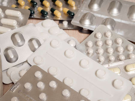 different medical pills in blisters close upの写真素材
