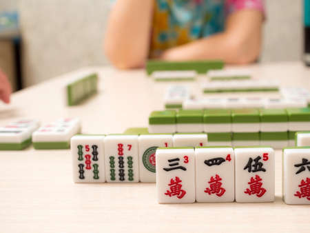 random dice position on the table when playing mahjong closeupの写真素材