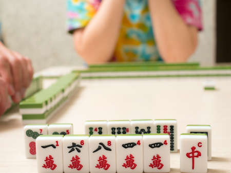 random dice position on the table when playing mahjong closeupの写真素材