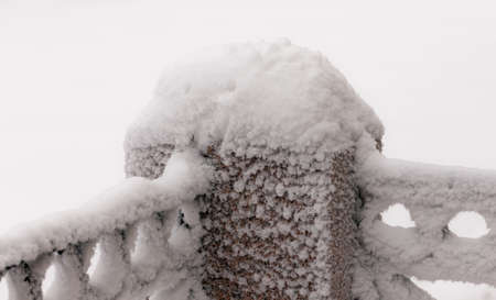 fragment of the embankment fence on a cold winter dayの写真素材