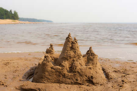 sand castle on the beach in summerの写真素材