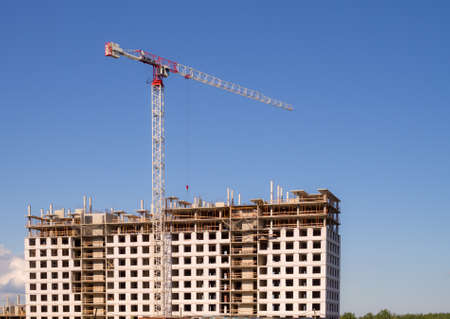 construction site of a new house with a crane