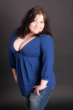 portrait of a girl in a blue dress on a black background