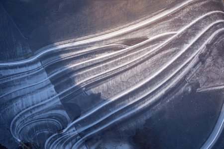 abstract patterns on thin ice in springの写真素材