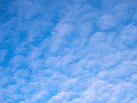 abstract blue sky background with cloudsの写真素材