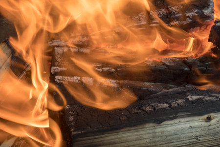 abstract bright fire from burning wood close upの写真素材