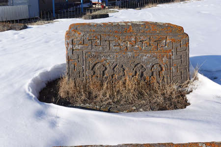 An ancient Armenian tombstone with carvings on it, Noratus Cemetery - Armeniaの写真素材