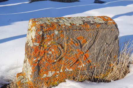 An ancient Armenian tombstone with carvings on it, Noratus Cemetery - Armeniaの写真素材
