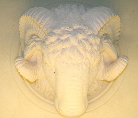 Bas-relief of a ram's head from a stoneの写真素材