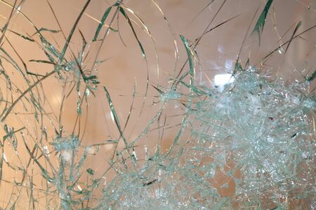 The surface of the broken glass in the window