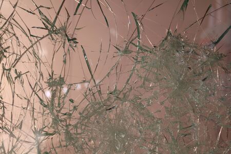 The surface of the broken glass in the window