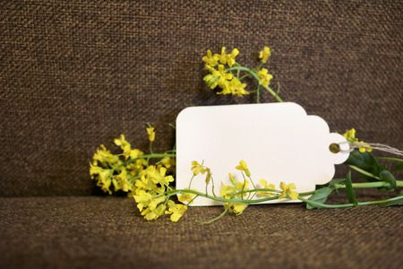 Woven fabric with a card and yellow flowers