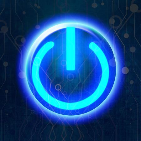 Blue glowing power buttonの写真素材