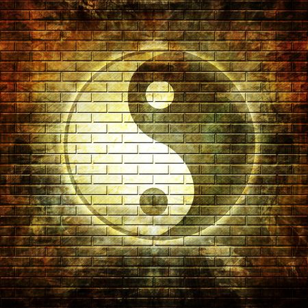 Grunge wall with graffiti yin yang symbolの写真素材