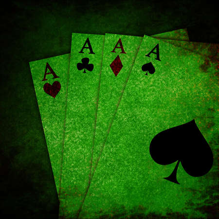 Vintage playing cards on a dark backgroundの写真素材