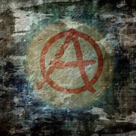Grunge wall with anarchist graffiti symbolの写真素材