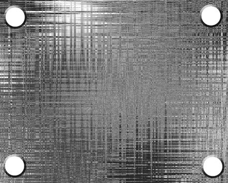 metal plate with drilled holes in the cornersの写真素材