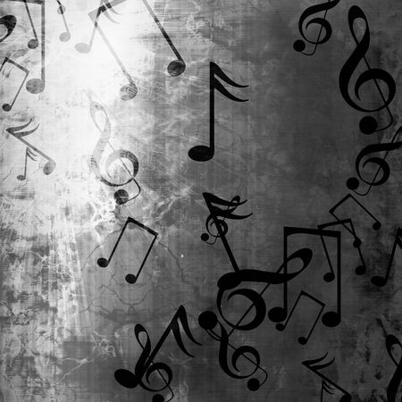 Worn metal plate with reflected light and musical notesの写真素材