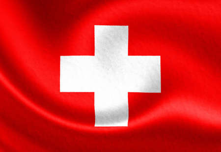 Swiss flag waving in the windの写真素材