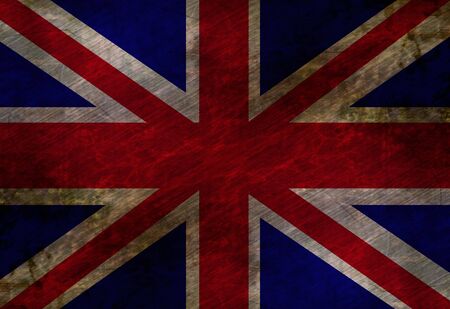 worn british flag waving in the windの写真素材