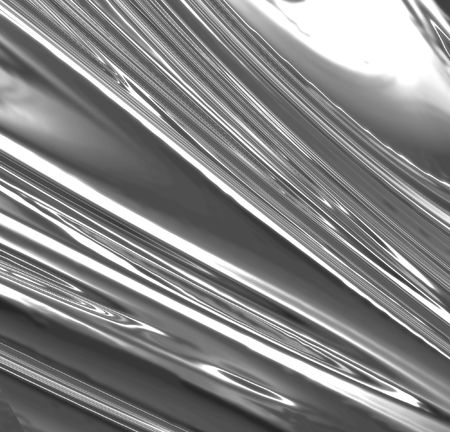 Silver metallic background with soft reflections in itの写真素材
