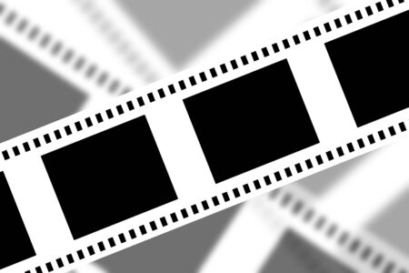 Negative film strip on a grey soft backgroundの写真素材