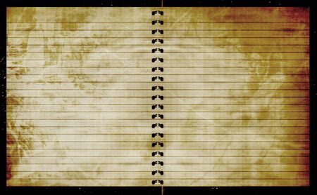 striped notebook with a leather black cover around itの写真素材