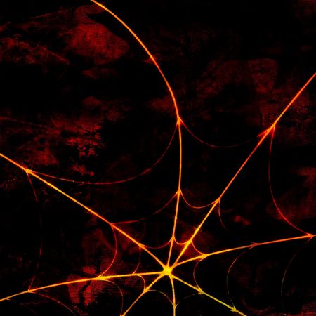 Glowing spider web on an old grunge backgroundの写真素材