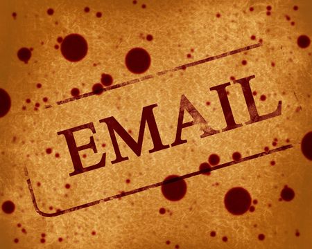 stamp with email written on it on an old backgroundの写真素材