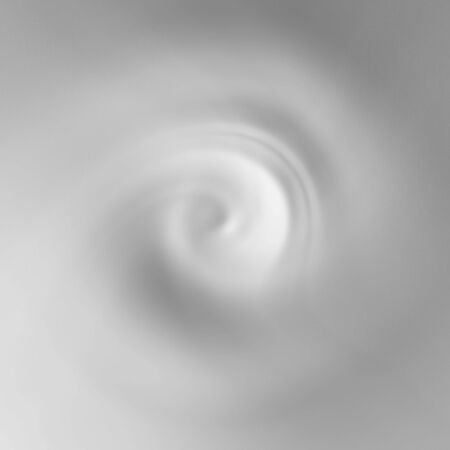 milk or whipped cream in a swirlの写真素材