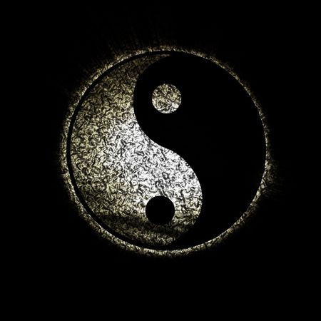 yin yang symbol on a dark backgroundの写真素材