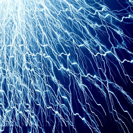electricity or lightning on a blue backgroundの写真素材