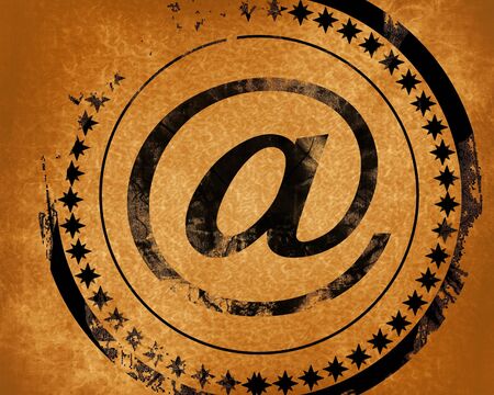 email symbol on a grunge like backgroundの写真素材