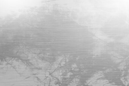 Brushed metal plate with some damage in itの写真素材