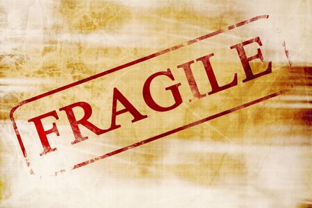 fragile stamp on a paper like backgroundの写真素材
