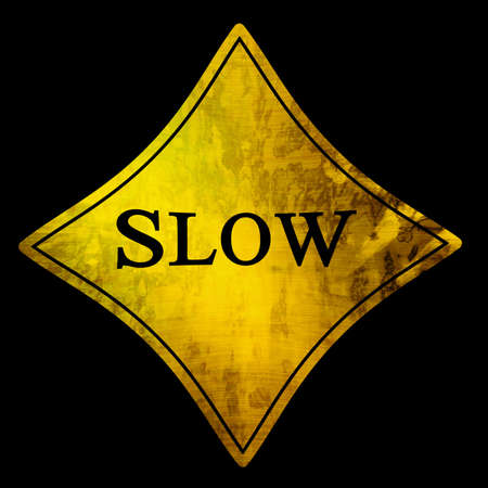 Slow sign on a solid black backgroundの写真素材