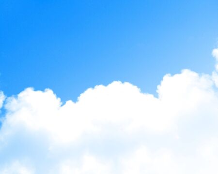 white clouds in a clear blue sky