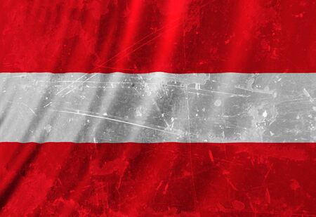 Austrian flag waving in the wind with some foldsの写真素材