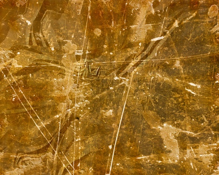 Wrinkled brown paper with some stains on it
