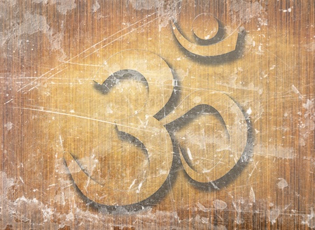 wooden board with the om aum symbol on itの写真素材
