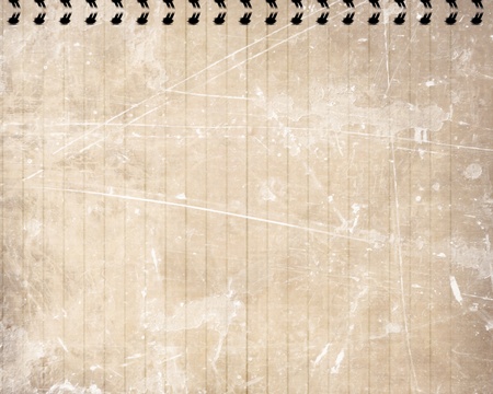 old notebook with grungy brown paper in itの写真素材